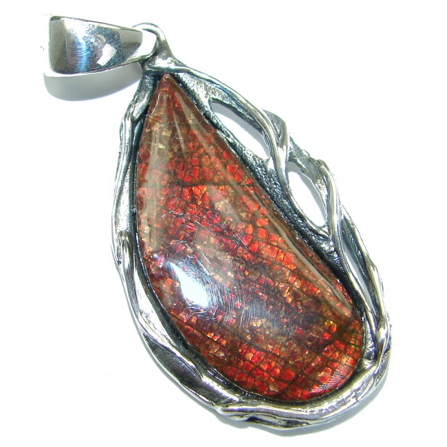 One of the kind genuine Ammolite .925 hammered Sterling Silver Pendant