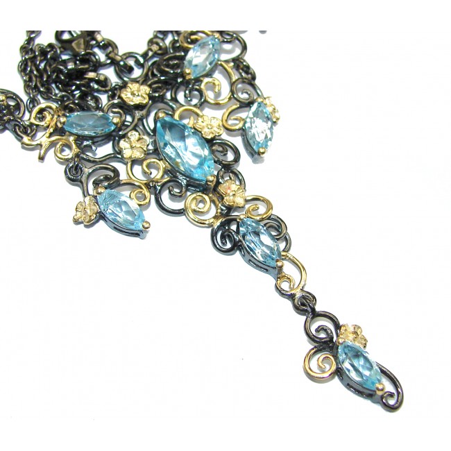 Andromeda Swiss Blue Topaz 14K Gold Rhodium over .925 Sterling Silver handcrafted necklace