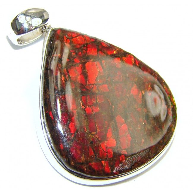 One of the kind genuine Ammolite .925 Sterling Silver handcrafted Pendant