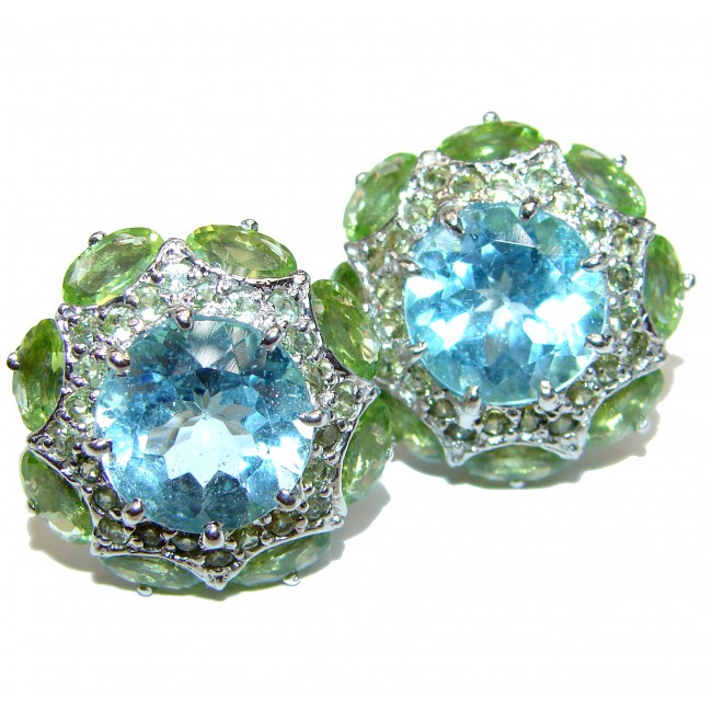 Melissa Authentic Swiss Blue Topaz rhodium over .925 Sterling Silver handmade earrings