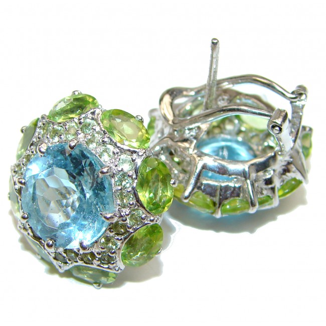 Melissa Authentic Swiss Blue Topaz rhodium over .925 Sterling Silver handmade earrings