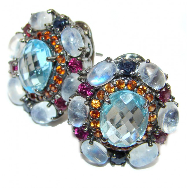 Emily Authentic Swiss Blue Topaz rhodium over .925 Sterling Silver handmade earrings