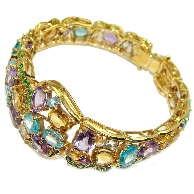 Get Glowing authentic Swiss Blue Topaz 14K Gold over .925 Sterling Silver handcrafted Bracelet